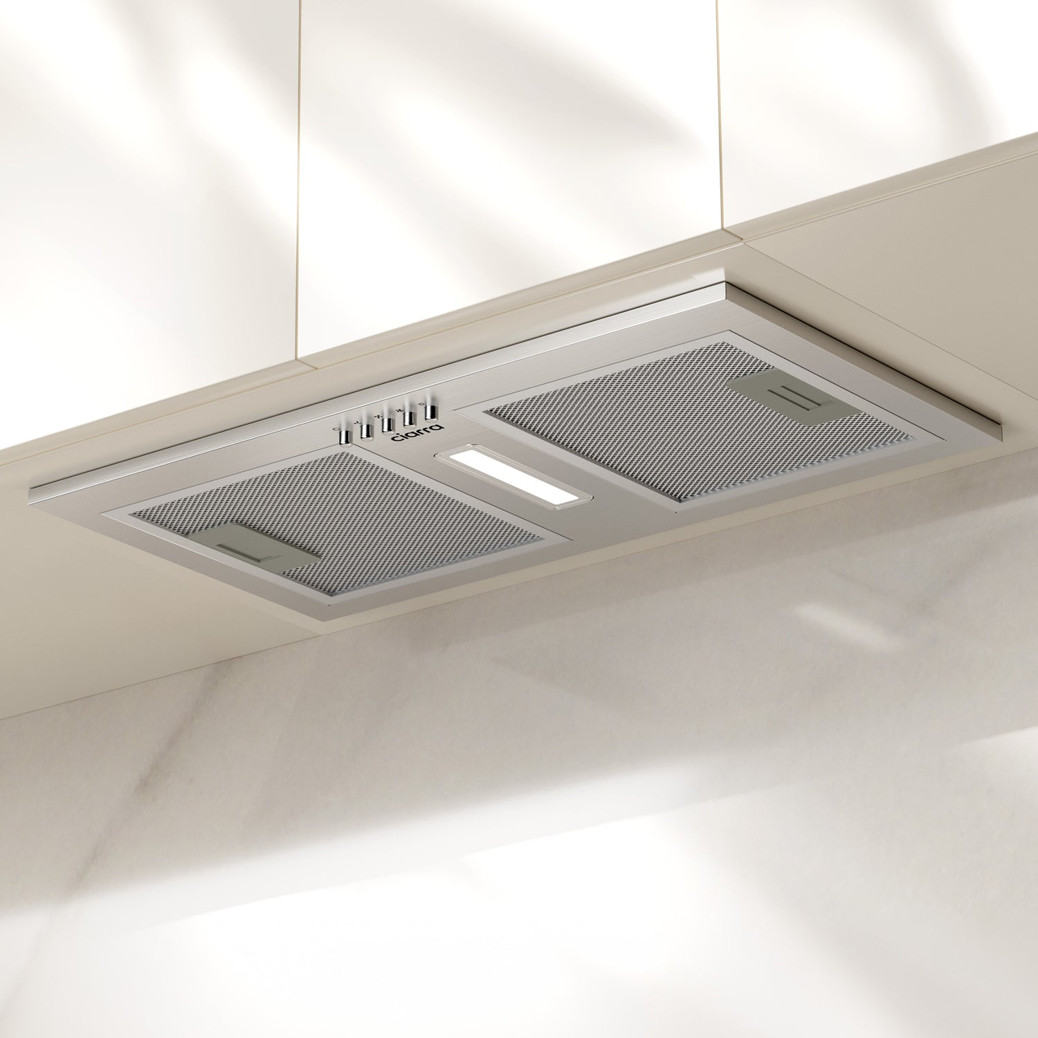 CIARRA silver integrated cooker hood installed in a modern European kitchen