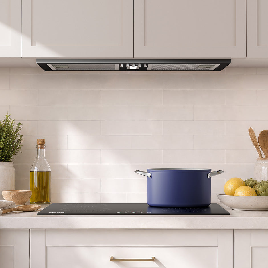 CIARRA black cooker hood installed in a modern European kitchen